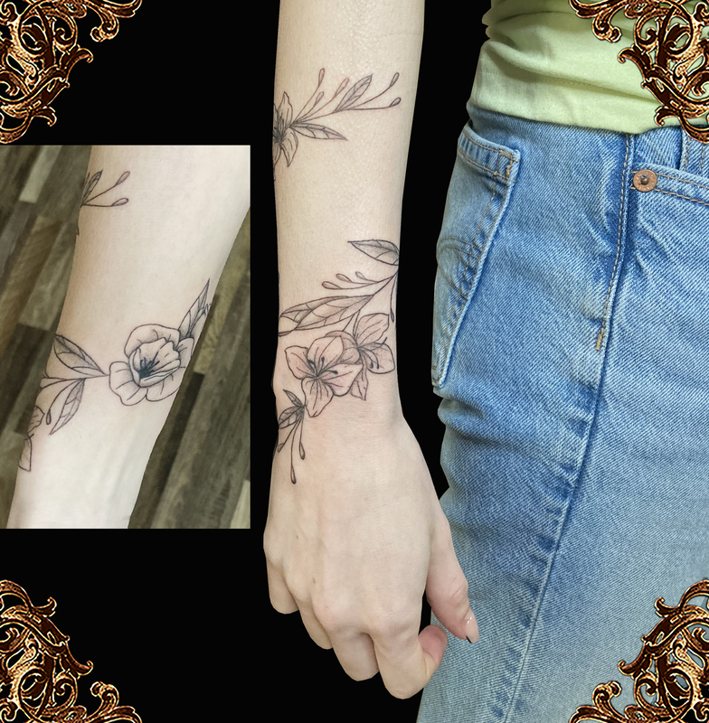 Custom floral wrist tattoo.