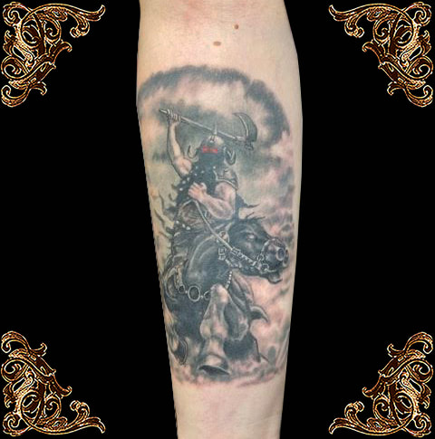 black and gray forearm tattoo of The Death dealer